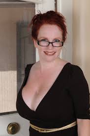 Busty amateur redhead getting naked and spitting in her perfect huge tits jpg x Redhead big tits amateur