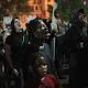 US police charged with beating undercover officer during protest - Yahoo News