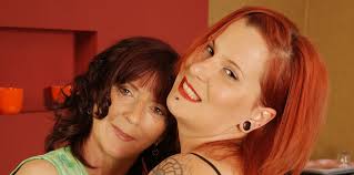 Group of mature lesbians fuck a young redhead jpg x Redhead mature lesbian