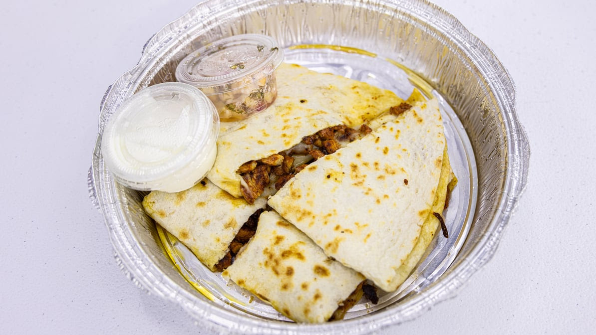 Tacos vs. Burritos Cantina by null