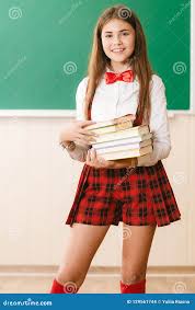 pretty school girls|Full length portrait of a beautiful little school girl standing isolated on  a white background Stock Photo - Alamy