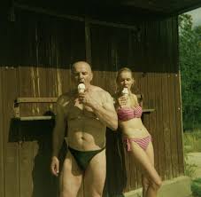 father daughter nude |father lifting daughter into the air in swimming pool Stock Photo - Alamy