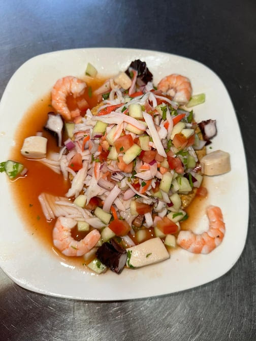 Mariscos y Sushi Tomateros by null