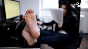 Candid soles at the office barefoot co worker sitting at her desk jpg x Office feet