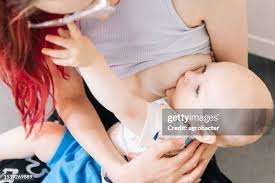 Mom suck child boy|mom and thumb sucking baby Stock Photo - Alamy