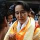 Aung San Suu Kyi set for first China visit 