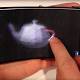 Researchers have developed a flexible holographic smartphone screen that plays a mean game of 'Angry Birds' 