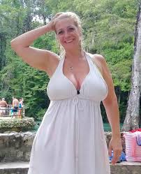 MILF big boobs|Clothed MILF with red hair unleashing huge all natural boobs