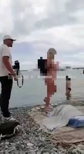 Porn image of woman medium shot profile shot photo partially nude beach spreading ass created jpg x Naked beach