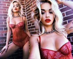 Rita ora sets pulses racing plunging black mini dress sultry snaps jpg x Rita ora