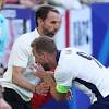 Harry Kane is sent FLYING into Gareth Southgate and collides with ...