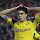 The Latest: Dortmund's Bartra out for weeks after bus attack 