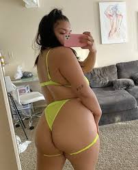Latina in golden bikini is oil jpg x Latina bikini