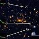 Light bending trick reveals supremely old, faint galaxy 