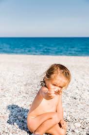  naked lil girl|The little girl on the beach hit the ball \u2014 Stock Photo ...