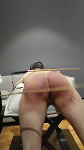 Femdom caning torture of a submissive male slave jpg x Women caning men