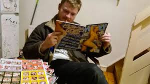 reading pornmag|Brunette milf jerking off some cock while reading
