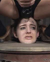 Riah fucked with head stuck in humiliator box cinematickink jpg x Sticking head in