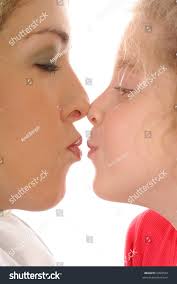 moter daughter oiss|Mother and daughter kissing in cafe - Stock Photo - Dissolve
