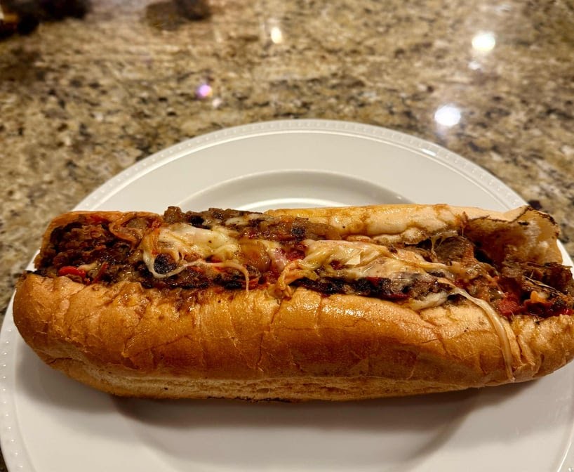 Tres’ House of Cheesesteaks by null