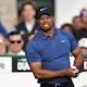 Woods withdraws from Dubai with back spasm 