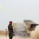 Iraqi army says it reached center of key town south of Mosul 
