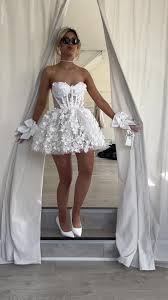 mini brides|The Bride Wore a Mini Wedding Dress with Sleeves for this Romantic City  Elopement