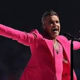 Robbie Williams puts on show-stopping performance AFL Grand Final