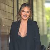 Chrissy Teigen Gives Pregnancy Update From 'In-Between Stage,' Shows Her Growing Baby Bump