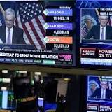 Wall Street points down after rate hike, ahead of GDP report