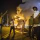 Attorney General Eric Holder in Ferguson - suburb shaken by protests