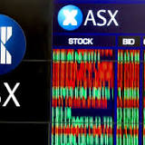 ASX trims losses as tech stocks dive; CBA posts $9.6bn profit; GrainCorp lifts guidance