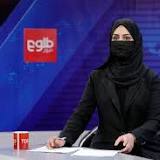 In full hijab, Afghan women TV presenters vow to fight on