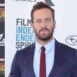 In A Bizarre Twist, Sources Claim Armie Hammer Is Living In Robert Downey Jr.'s House