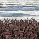 Thousands strip naked on Australia's Bondi Beach for Spencer Tunick cancer awareness photo shoot