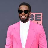 Diddy Makes Vibrant Arrival at the 2022 BET Awards In Pink Suit & Sleek Shades With Patent Leather Loafers