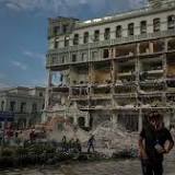 Rescuers look for victims at Cuba hotel after blast kills 22