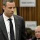 Pistorius trial begins amid tears and 'scream' testimony