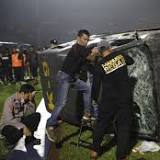 More than 120 football fans dead at Indonesian top-flight match, say police
