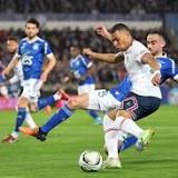 Soccer-Mbappe bags brace as PSG held by Strasbourg