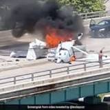 A small plane crashed on a bridge near Miami, striking an SUV